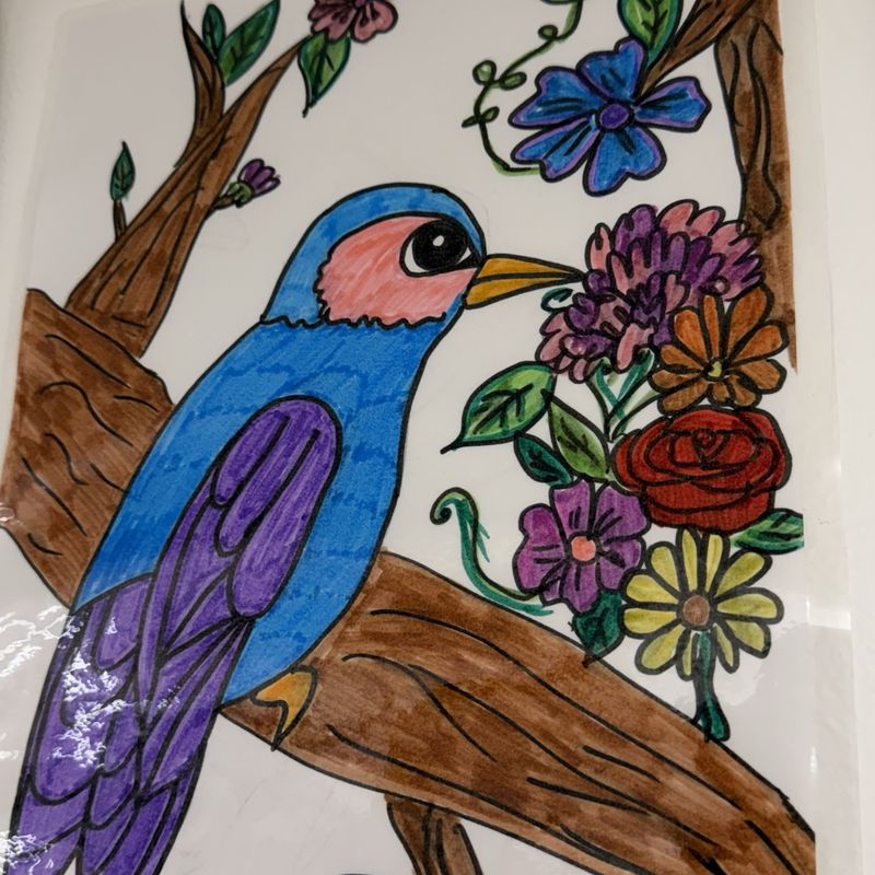 A blue bird painted on a flowering branch with roses and violets