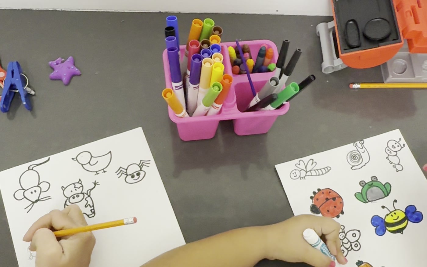 A child creating art in the Glendale center