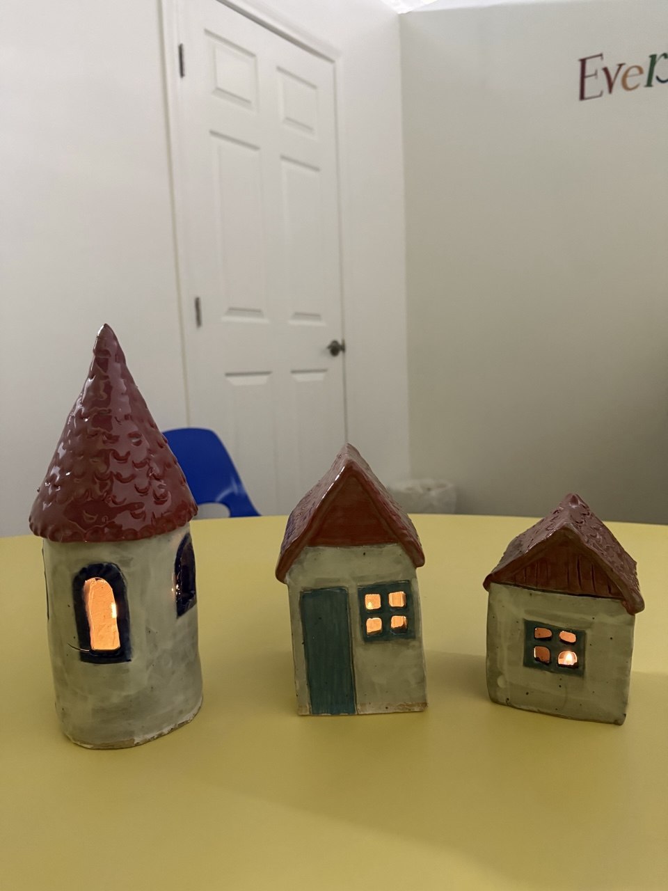 Painted clay houses made by young artists in Glendale pottery class