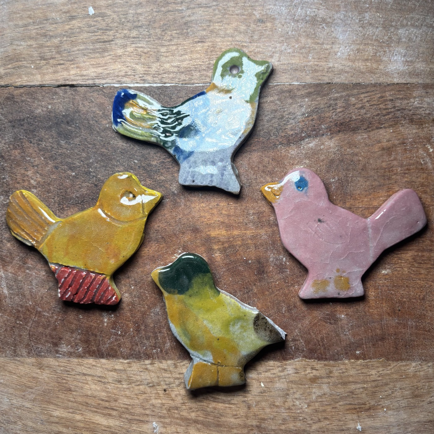 Hand-painted clay birds — pottery for kids of all abilities in Glendale