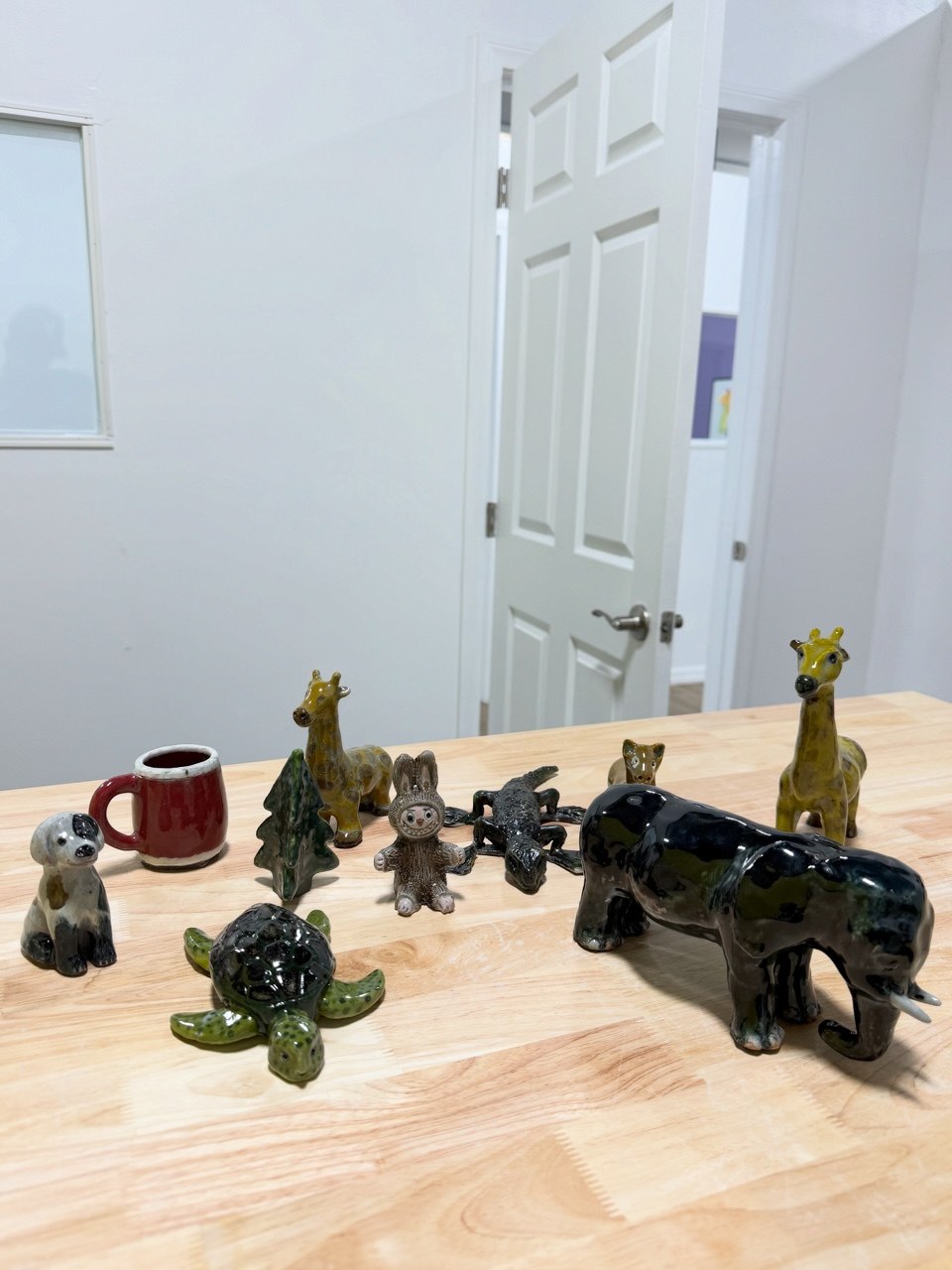 Finished animal pottery pieces made in the Van Nuys studio