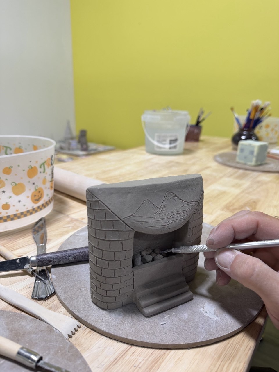 Finished clay fireplace sculpture made in the Van Nuys pottery studio