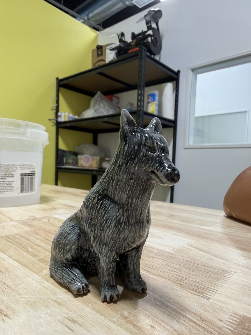 Finished clay wolf sculpture made in the Van Nuys pottery studio