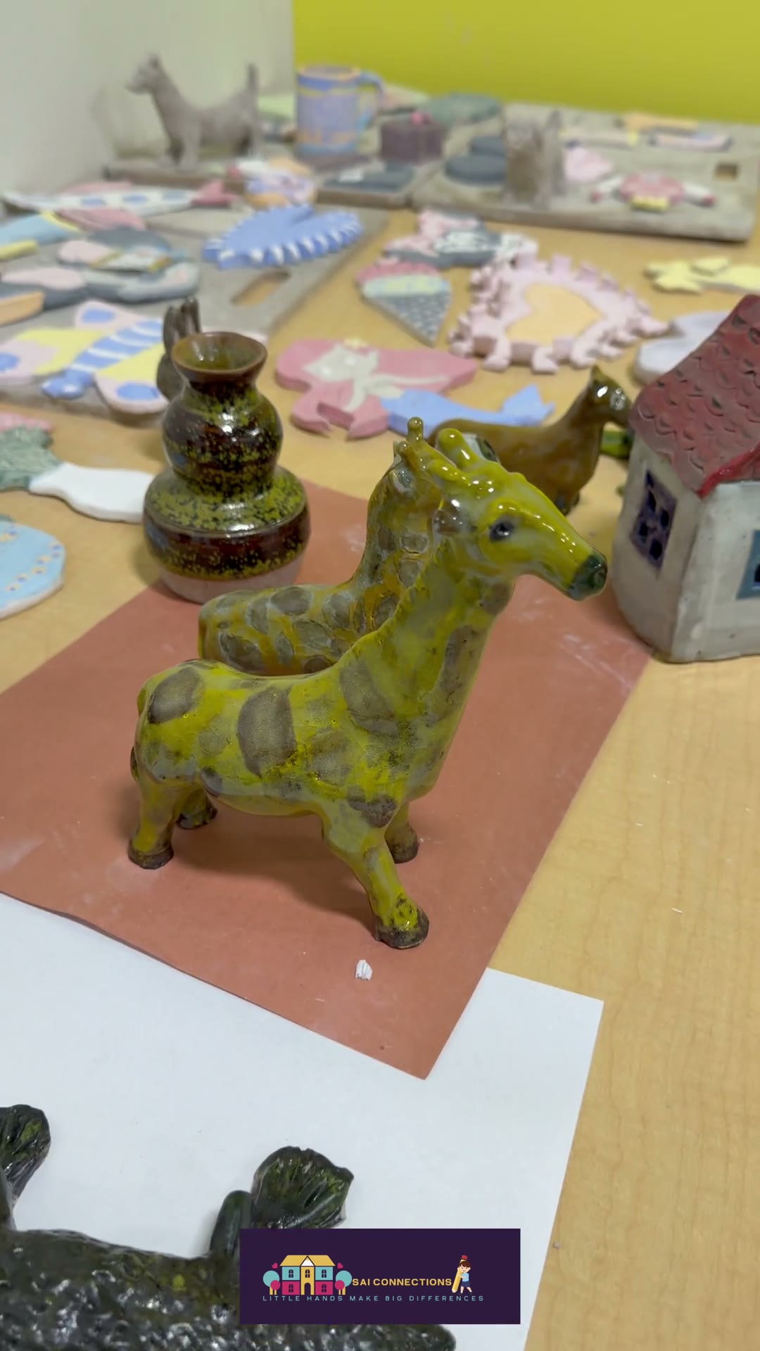 Finished hand-painted clay pieces from the Van Nuys adult pottery studio